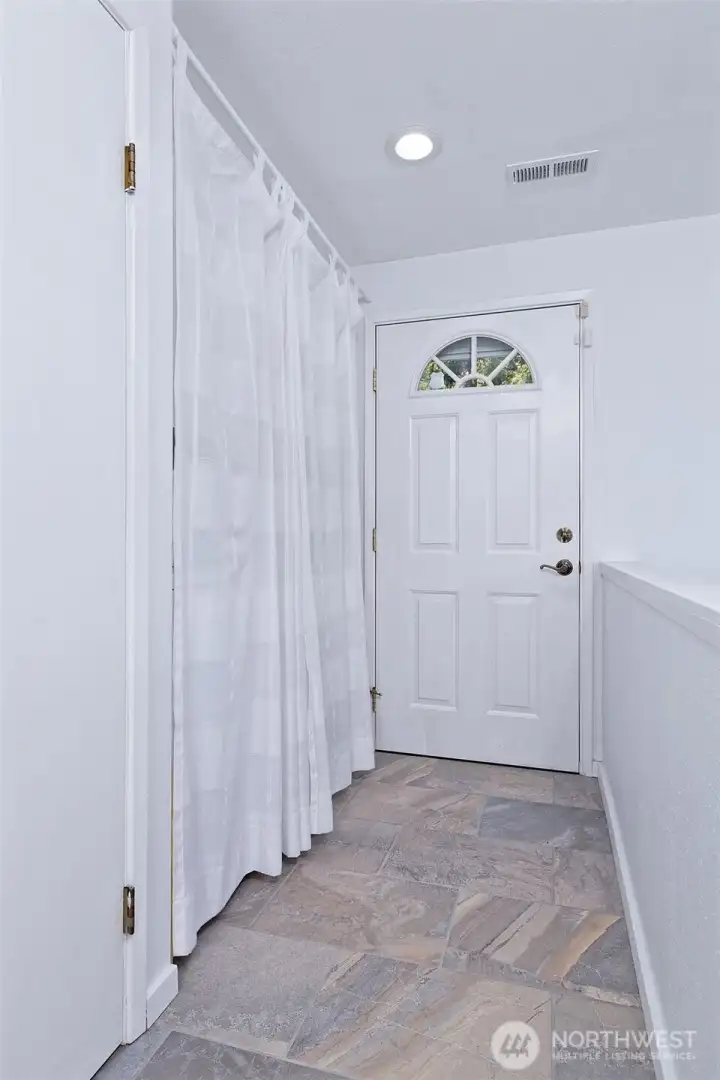 The upstairs entry.
