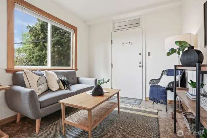 Cottage upper level living room with cork floors, cedar trim, recessed lights and westerly territorial views.