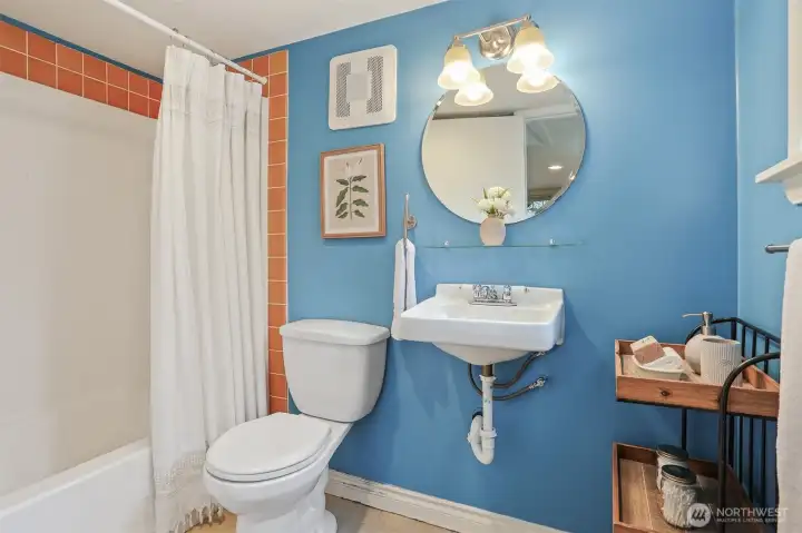 Cottage lower level bedroom and full bathroom. Can be accessed with outside level entry or by the alternating tread staircase.