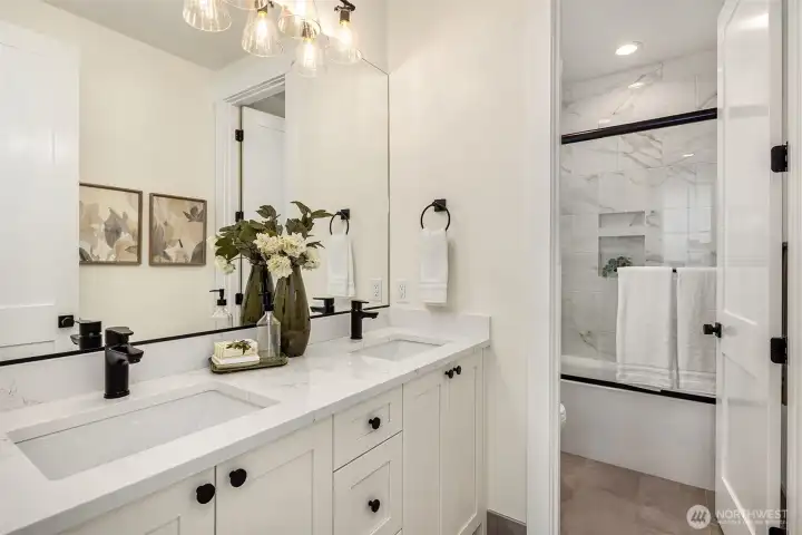 Shared bath between bedrooms 1 & 2