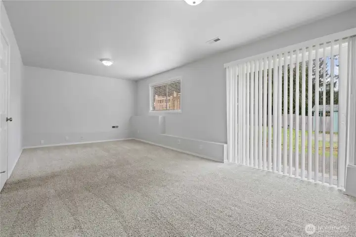 Lower level rec room is a fabulous flex space and has access to the outside.  TV room, Game room, home office, work out room, playroom...endless possibilities