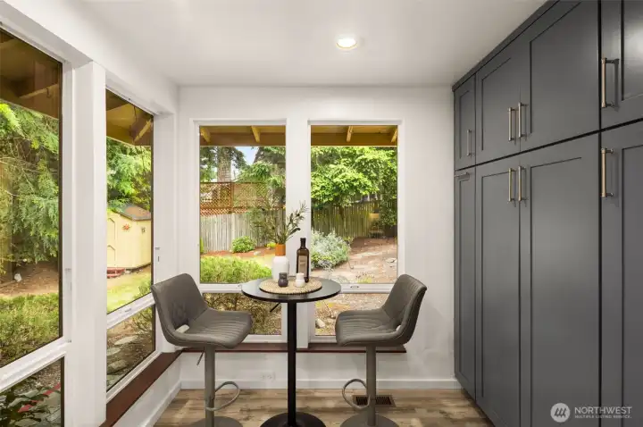 Casual dining nook overlooking the private backyard.