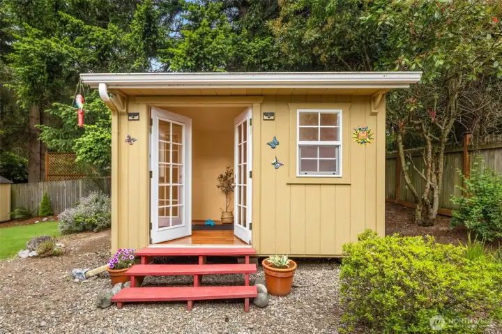 Detached studio offering an ideal space for a home office, art studio, fitness room, or creative retreat.