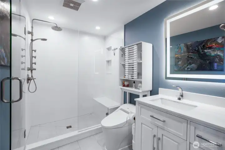 Primary en suite bathroom with heated floors.