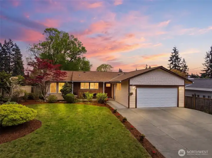 Daylight rambler with spacious front yard and strong curb appeal