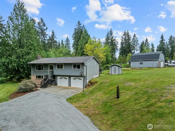 This home is well appointed on 5+ acres to love & share.