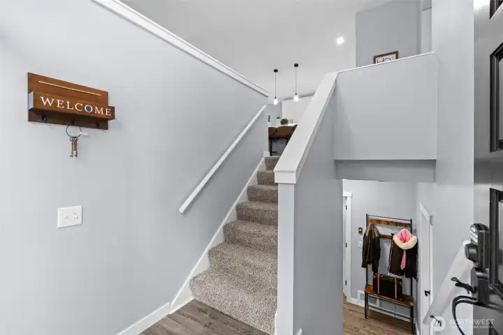 An inviting front porch entry to the foyer.
