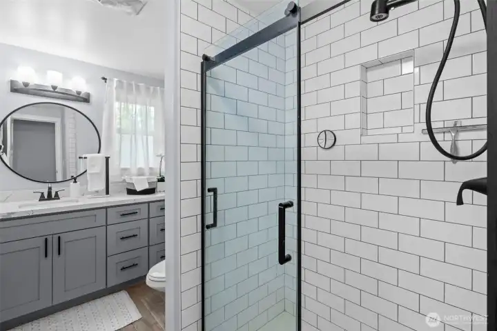 Updated main 3/4 bathroom. Memorable design and finishes.