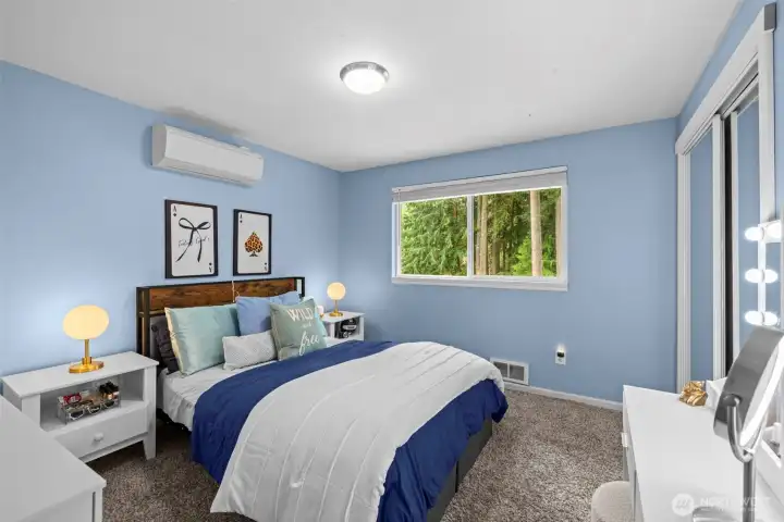 Third upper level bedroom with mini spit.