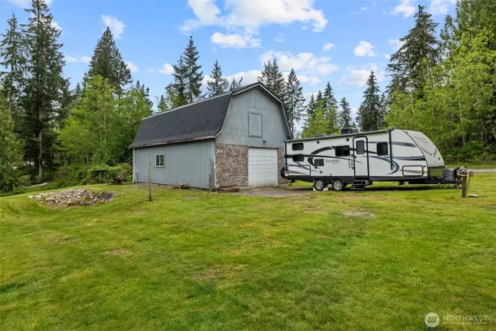 Shop and RV parking. Impressive shop is wired for both 110 & 220 power, plus a loft offering endless possibilities.