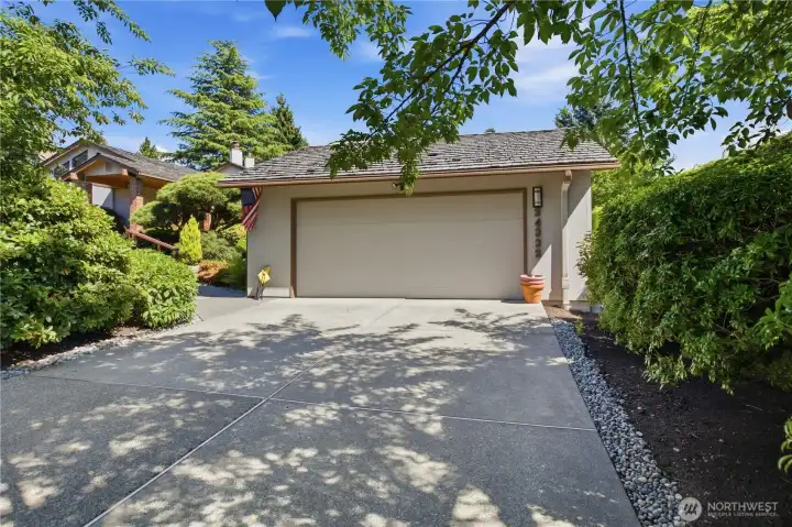 Garage with long driveway.