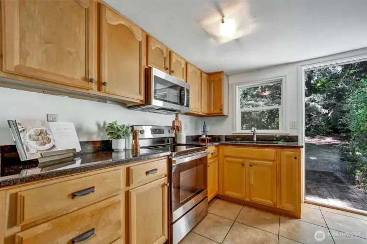 Kitchen with door access to the back yard.