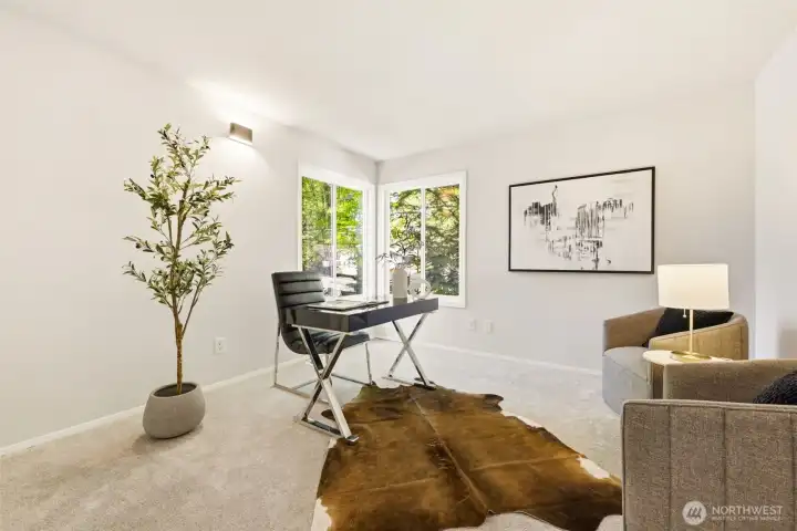 The versatile main-level bedroom is ideal for guests, a private home office, or multigenerational living. The versatile main-level bedroom is ideal for guests, a private home office, or multigenerational living.