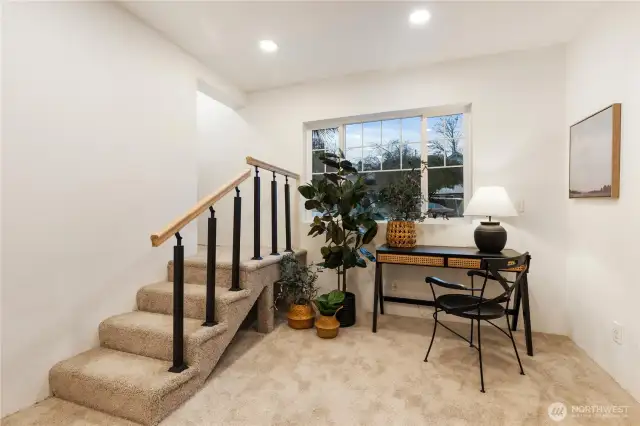 Newly carpeted rec room off living room.