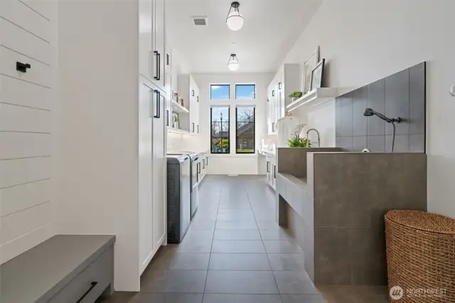Unbelievable laundry with dog wash station, sink, built-ins for a ton of storage