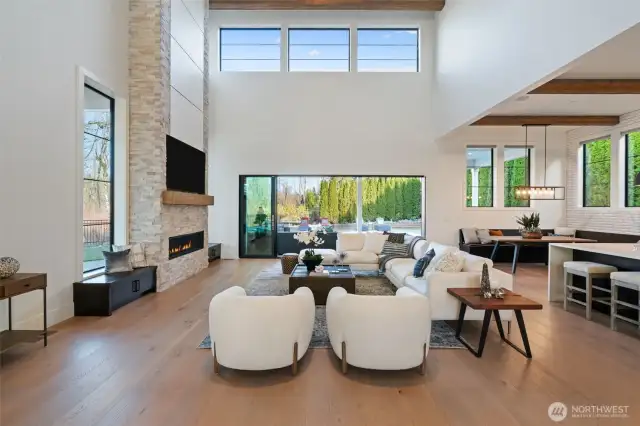 Open and light with floor to ceiling windows and a wall of sliding doors