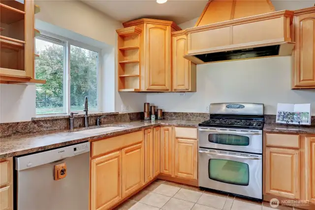 The custom kitchen would please any chef with stainless appliances and plenty of cabinet and counter prep area - works great even with multiple cooks.