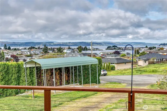 The view from the deck toward the marina, bay, sound and mountains.