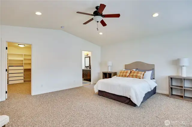 The door to the giant walk-in closet is on the left, and the full bathroom on the right.