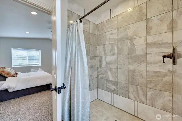The walk-in shower in the primary bath.