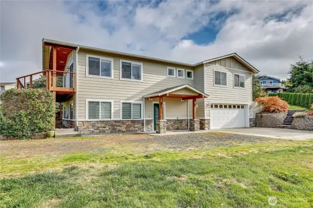 This spacious home is set at the top of a quiet cul de sac, Cedar Lane.