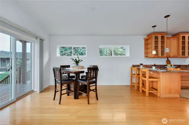Plenty of space for any size dining table here, as well as seating on both sides of the bar.