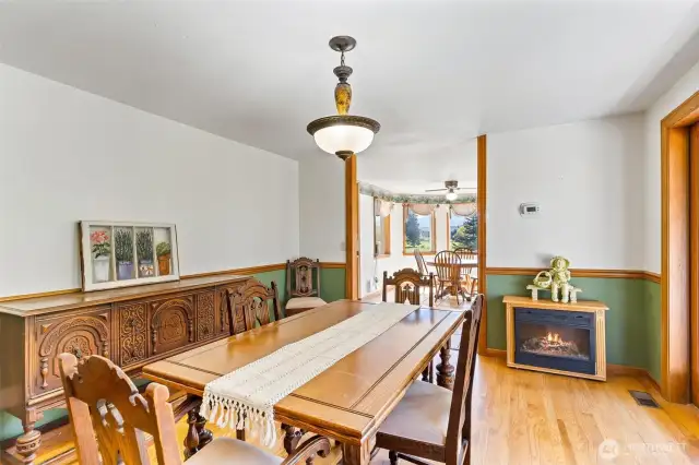 Formal dining room with french doors to front porch.