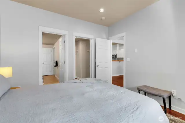 Another view from the primary showing the walk-in-closet and bathroom