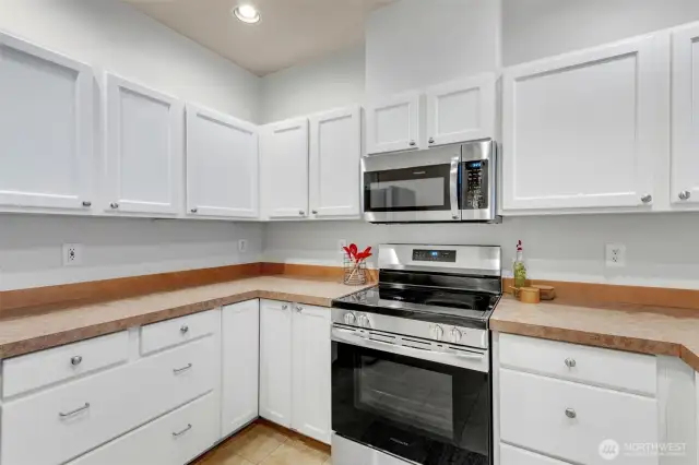 Generous cabinet storage throughout the kitchen