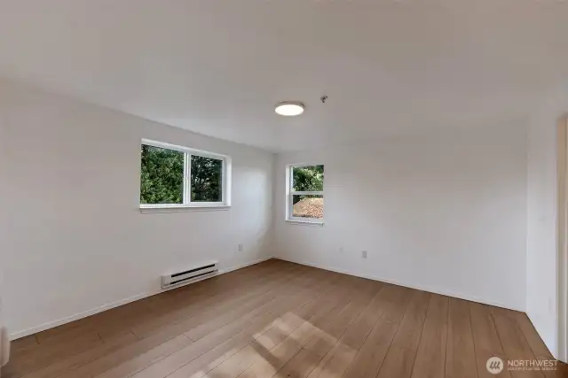 Primary suite with walk-in closet and ensuite bath