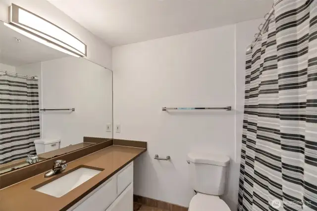 A full bath in the primary suit