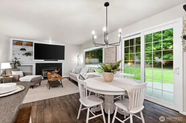 This room opens up to an expansive backyard patio where you can host an unforgettable day.