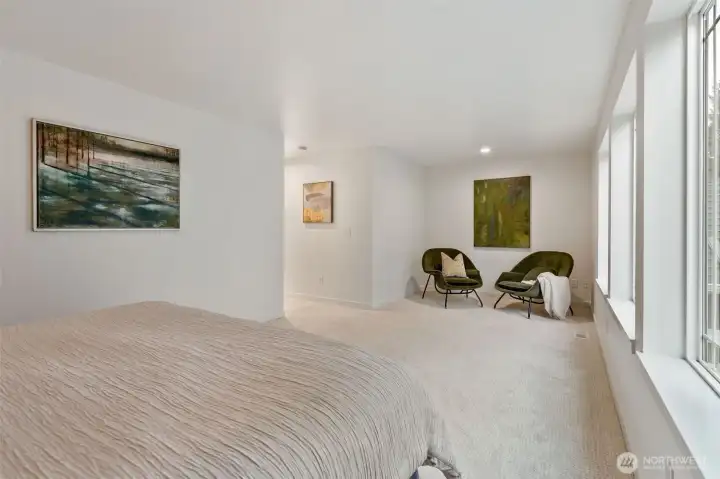 Cozy sitting area in the primary bedroom