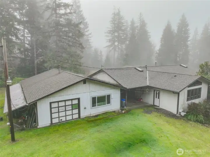 Garage/Shop #1 30 x 39 with half being a Apartment, Covered area on Left is: 7 x 39