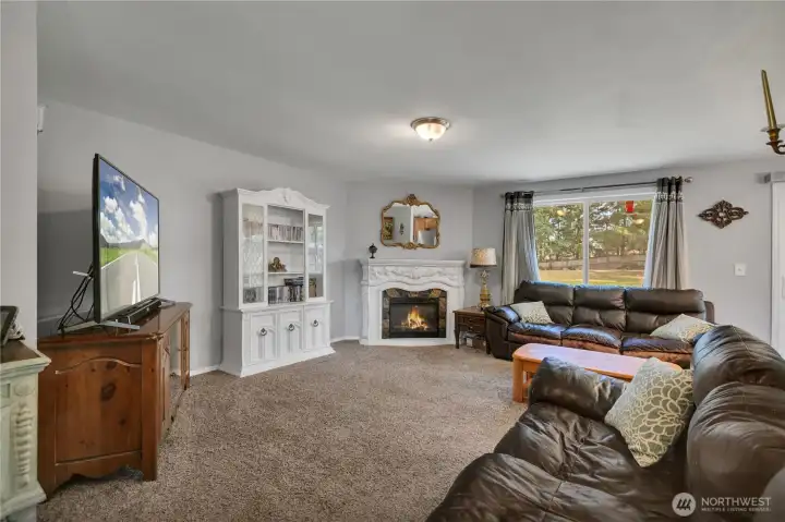 Fireplace is electric and does not convey.