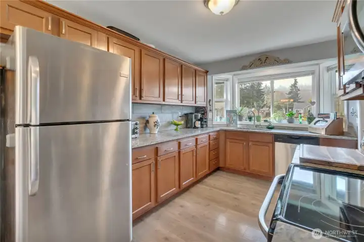 Plenty of cabinets in the kitchen. Refrigerator stays