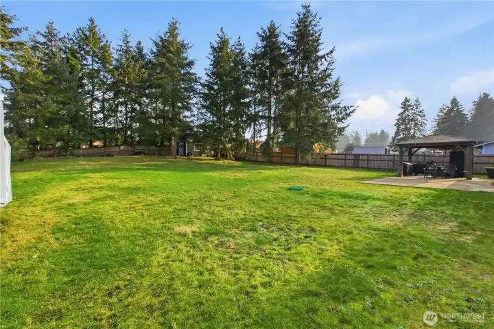 Huge, flat backyard for gardening or play