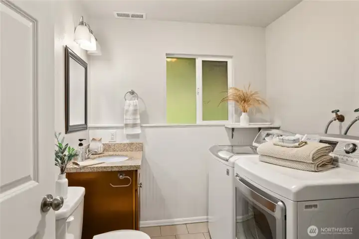 Lower level laundry room and half bath