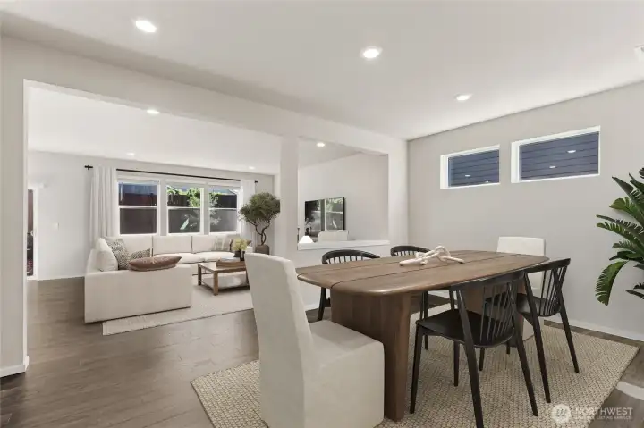 Dining room with transom windows.  Colors and finishes may vary.