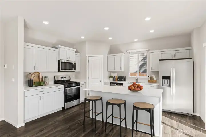 Kitchen island with seating.  Colors and finishes may vary.