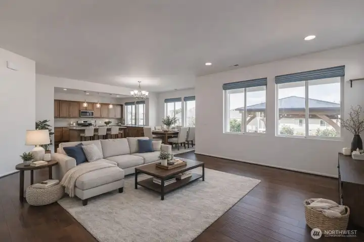 Virtually staged. Open layout connects seamlessly to dining and kitchen.