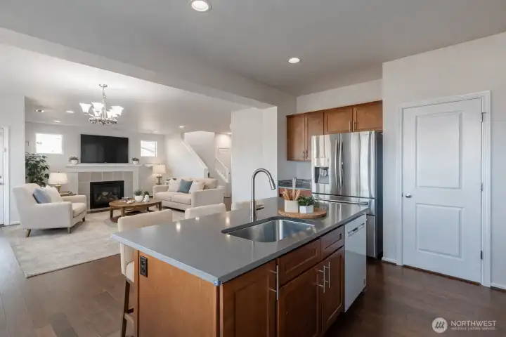 Virtually staged. Open sightlines enhance connectivity between rooms.