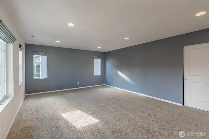 Another view of the bonus room. Ideal for media, play, fitness, or flexible living.