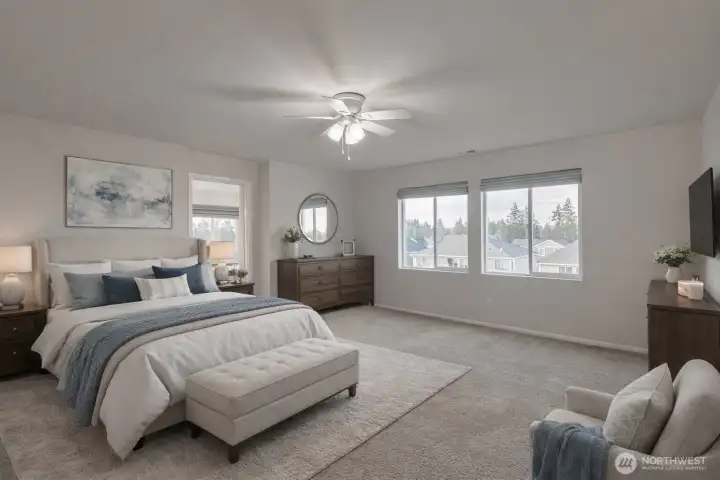 Virtually staged. Generous primary bedroom with natural light and private bath.