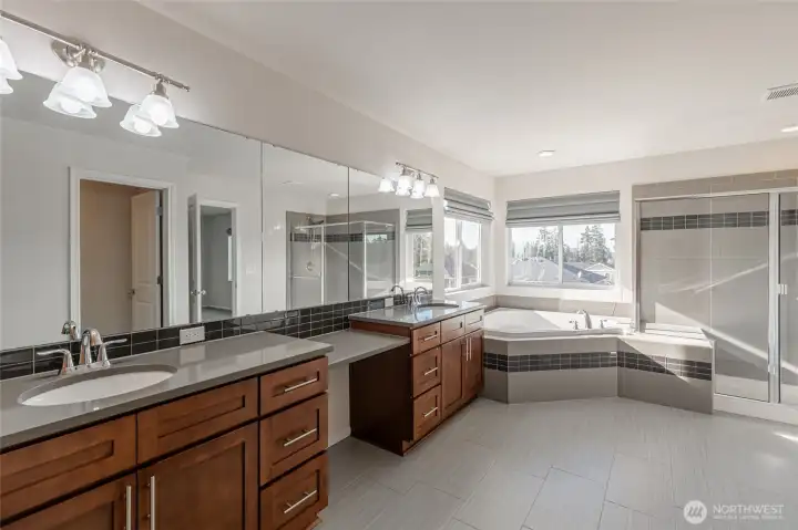 Spa-like primary bath with clean lines and finishes that emphasize modern elegance.