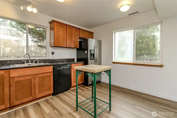 Plenty of room for larger island or table and chairs.