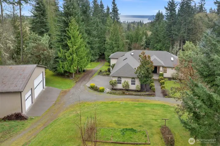 Private gated entry into this terrfic home on 5.8 acres, 1270 sq ft MIL unit, detached 1440 sq ft shop and approx. 2635 sq ft in the home. Heat pump for AC and eficiency, central vac system, surround sound speakers in 3 rooms. This is deeded land, no HOA. This home has everythong you are looking for. Total bedrooms up & down is 5, with 3.75 baths, a den, bonus room etc....Priced at only $274 a sq ft....