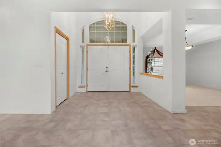 Inside the front door...formal dining to the right. Please remove shoes or use Booties , carpets and home interior were just professionally cleaned.