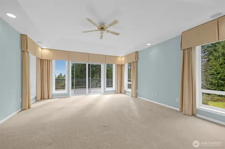 Primary suite hasn aq sliding glass door out to your full length dedc. Built-in ceiling speakers.