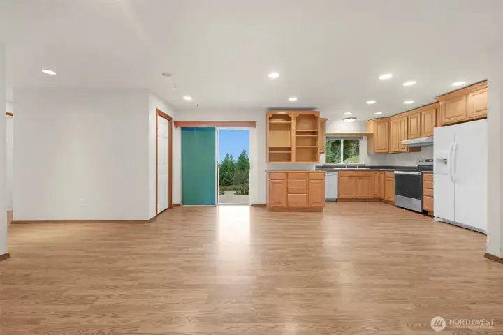 Living area and kitchen in ther MIL unit. Entry is through the sliding glass door.